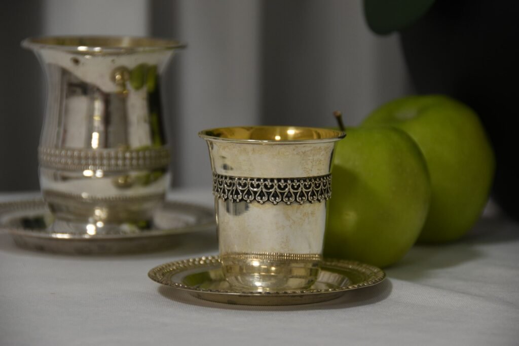 Silver tumblers on a silver plate
